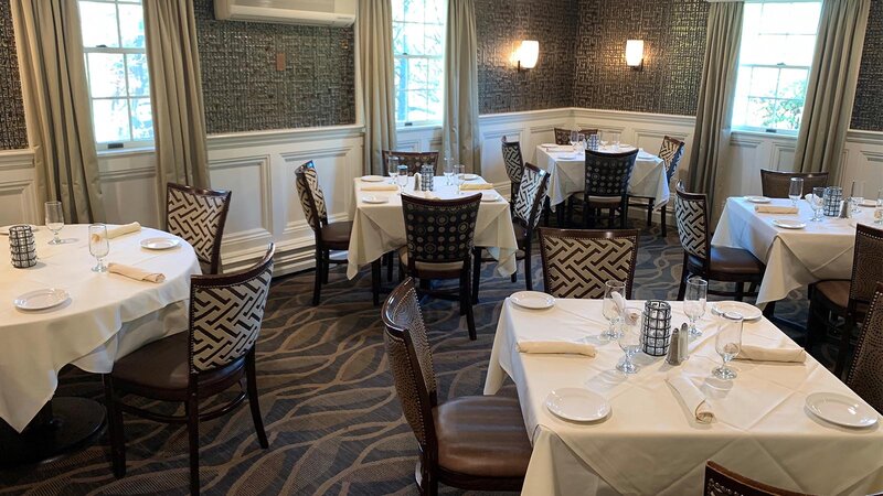 Chianti Room - Five set tables set for four guests